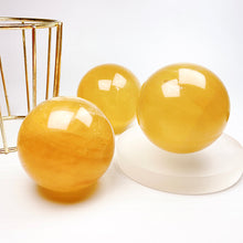 Load image into Gallery viewer, Natural Honey Calcite Sphere